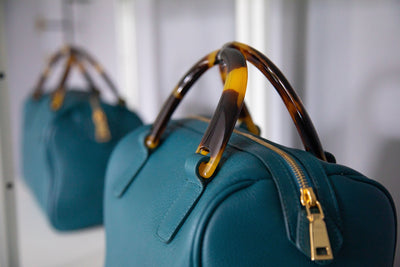Teal real leather handbag with acrylic handles